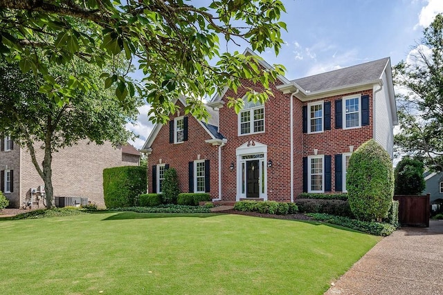 517 Ridgestone Dr, Franklin, TN 37064 - view of front of home featuring a front yard, brick siding, and a shingled roof