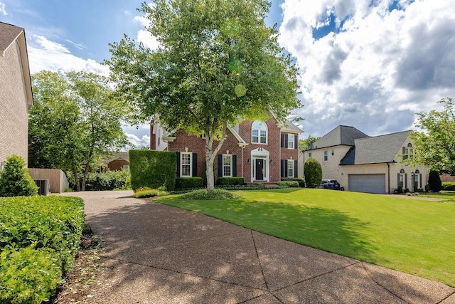 517 Ridgestone Dr, Franklin, TN 37064 - view of front facade with brick siding and a front lawn