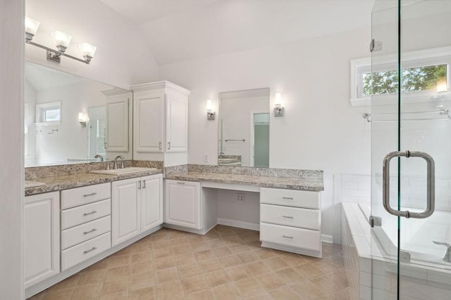 517 Ridgestone Dr, Franklin, TN 37064 - full bath with vaulted ceiling, vanity, a shower stall, a bath, and tile patterned flooring