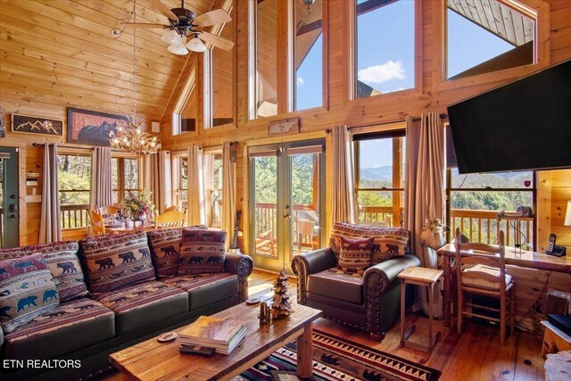 2732 Heather Ln Way, Sevierville, TN 37862 - living area with hardwood / wood-style flooring, plenty of natural light, ceiling fan, a chandelier, and high vaulted ceiling