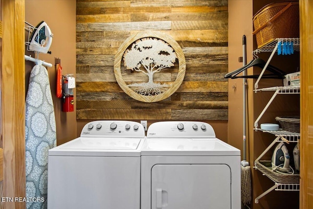 2732 Heather Ln Way, Sevierville, TN 37862 - laundry room with independent washer and dryer and wood walls