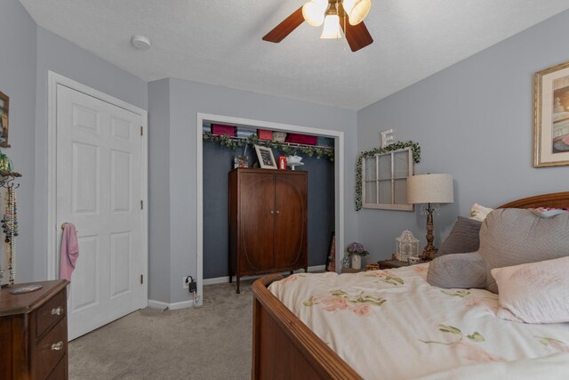 373 Baronswood Dr, Nolensville, TN 37135 - bedroom with light carpet, a closet, baseboards, and ceiling fan