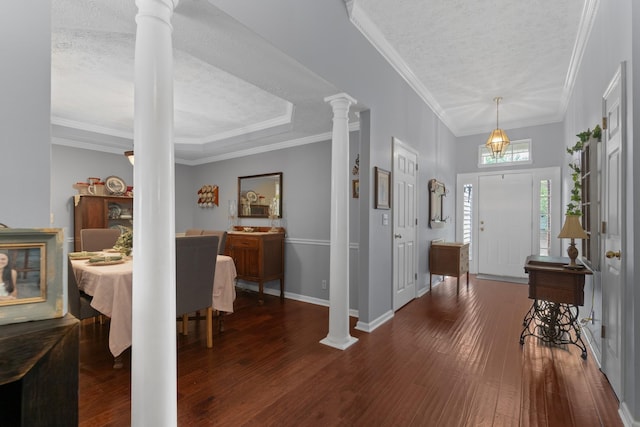 373 Baronswood Dr, Nolensville, TN 37135 - foyer entrance with ornate columns, a textured ceiling, wood finished floors, baseboards, and crown molding