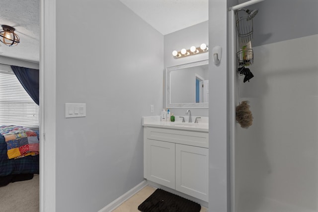 373 Baronswood Dr, Nolensville, TN 37135 - bathroom featuring vanity, ensuite bath, a textured ceiling, baseboards, and a shower