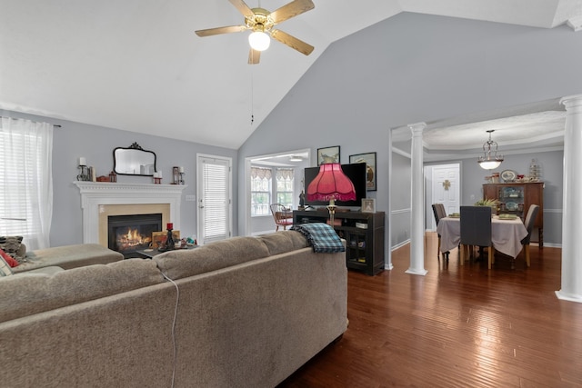 373 Baronswood Dr, Nolensville, TN 37135 - living area with ornate columns, ceiling fan, a glass covered fireplace, dark wood-style floors, and high vaulted ceiling