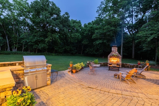 460 Whistler Cv, Franklin, TN 37067 - view of patio / terrace with exterior fireplace and exterior kitchen