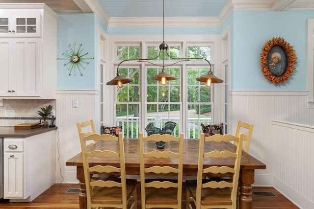 460 Whistler Cv, Franklin, TN 37067 - dining area featuring a wainscoted wall, wood finished floors, and crown molding