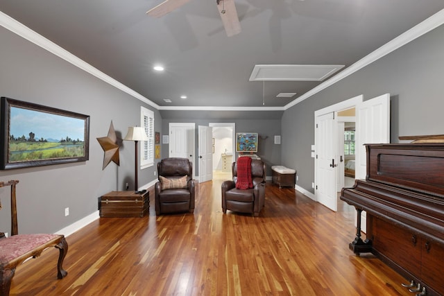 460 Whistler Cv, Franklin, TN 37067 - sitting room featuring attic access, wood finished floors, baseboards, crown molding, and a ceiling fan