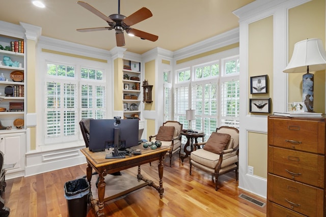 460 Whistler Cv, Franklin, TN 37067 - office area featuring a ceiling fan, crown molding, light wood-type flooring, and built in shelves