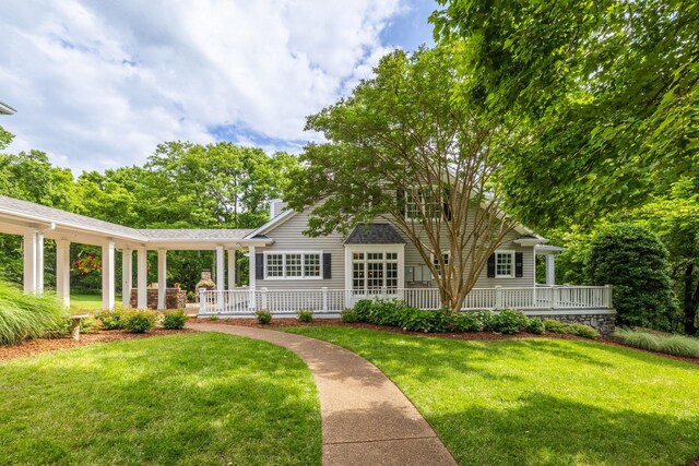 460 Whistler Cv, Franklin, TN 37067 - rear view of house with covered porch, a yard, and a chimney
