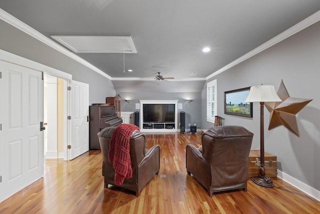 460 Whistler Cv, Franklin, TN 37067 - living room with attic access, light wood-style flooring, baseboards, crown molding, and ceiling fan