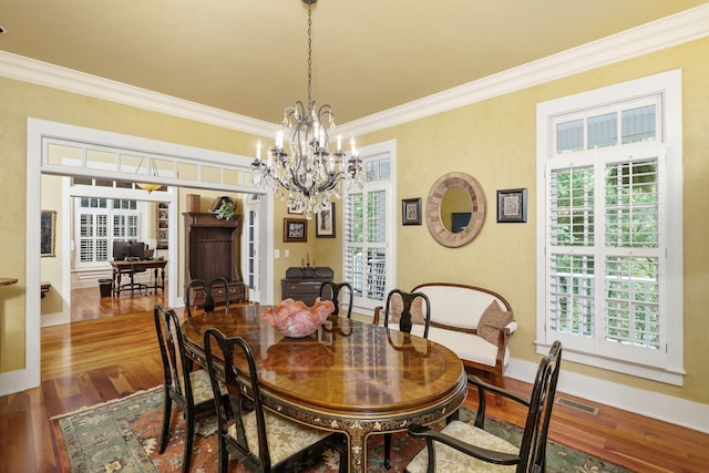 460 Whistler Cv, Franklin, TN 37067 - dining room featuring ornamental molding, wood finished floors, a chandelier, and baseboards