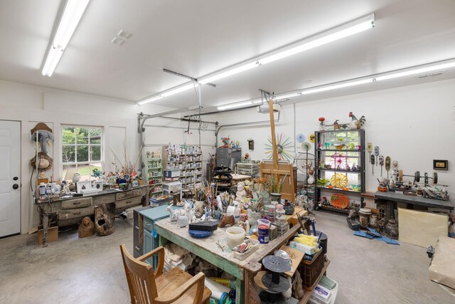 460 Whistler Cv, Franklin, TN 37067 - garage with a workshop area and a garage door opener