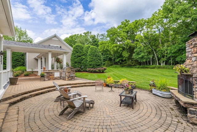 460 Whistler Cv, Franklin, TN 37067 - view of patio / terrace with an outdoor stone fireplace