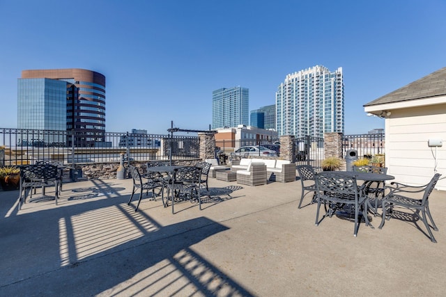 1803 Broadway Unit 201, Nashville, TN 37203 - view of patio / terrace with a view of city and outdoor dining area