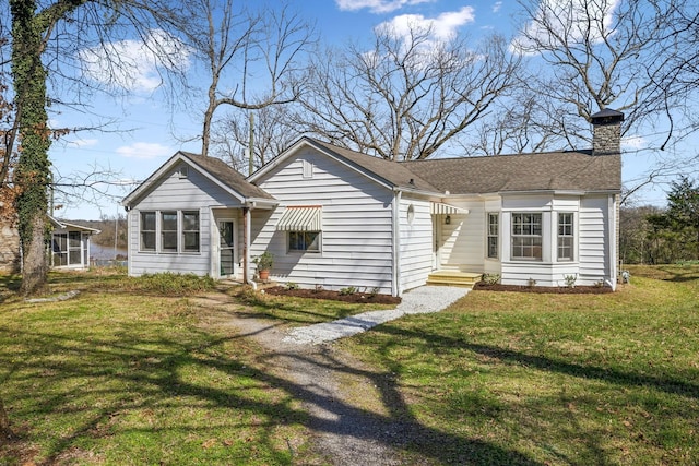 4430 Brush Hill Rd, Nashville, TN 37216 - view of front facade with a front lawn and a chimney