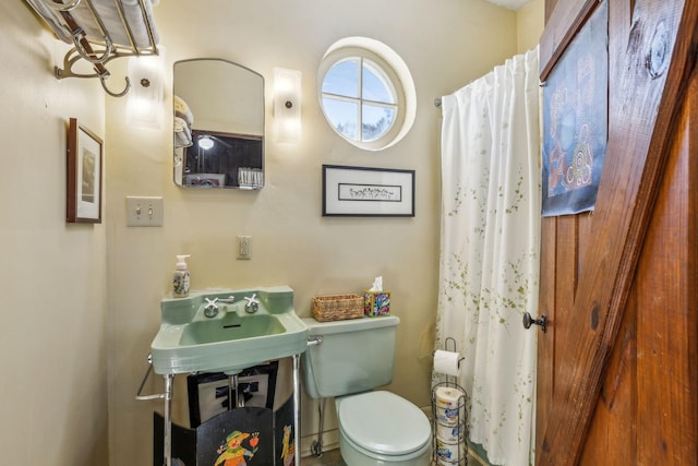 4430 Brush Hill Rd, Nashville, TN 37216 - full bathroom with toilet, a shower with shower curtain, and a sink