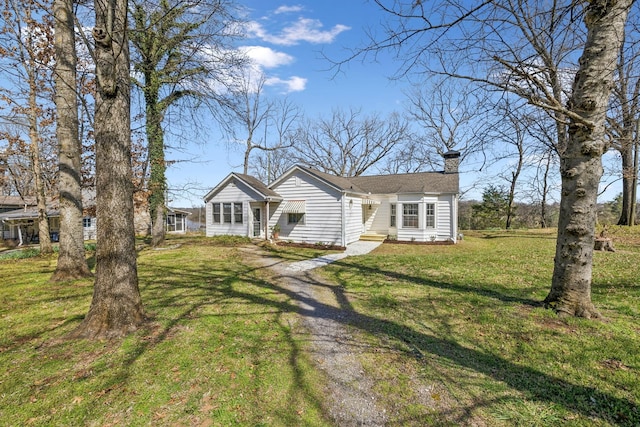 4430 Brush Hill Rd, Nashville, TN 37216 - view of front facade with a chimney, a front yard, and entry steps
