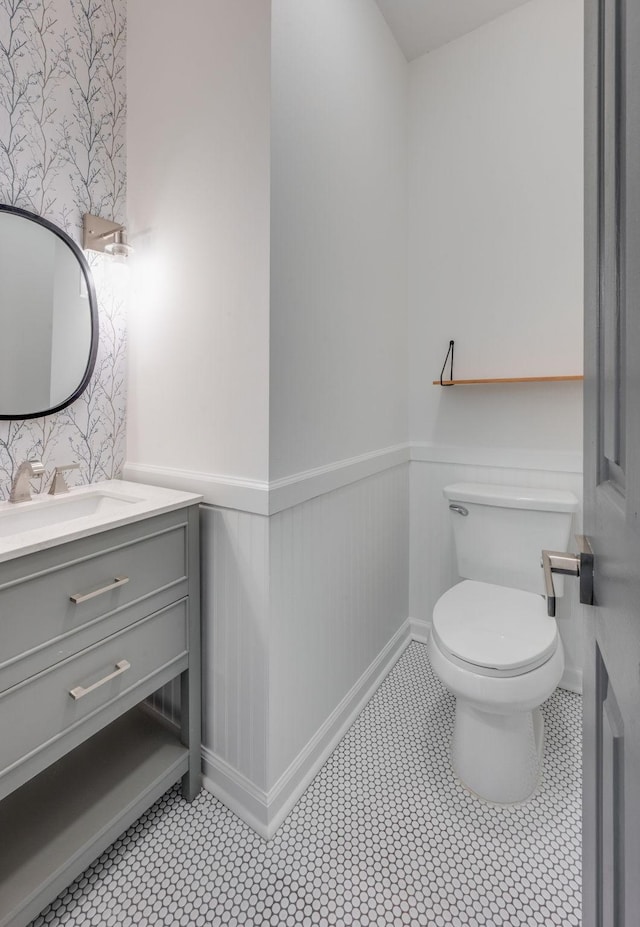 608 Claridge Ct, Franklin, TN 37064 - bathroom featuring wainscoting, vanity, toilet, and tile patterned floors