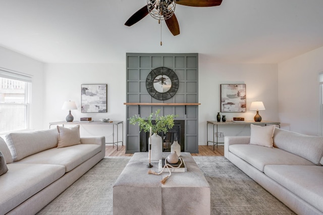 608 Claridge Ct, Franklin, TN 37064 - living room featuring ceiling fan, a glass covered fireplace, and wood finished floors
