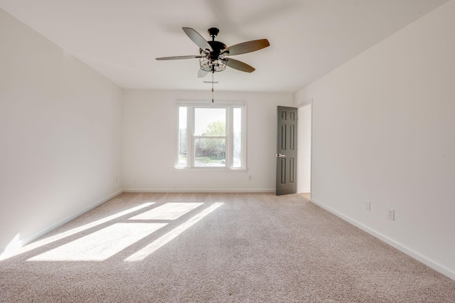 608 Claridge Ct, Franklin, TN 37064 - spare room featuring light carpet, ceiling fan, and baseboards