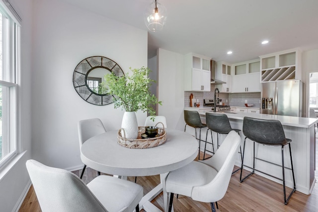 608 Claridge Ct, Franklin, TN 37064 - dining space with baseboards, plenty of natural light, light wood-style floors, and recessed lighting