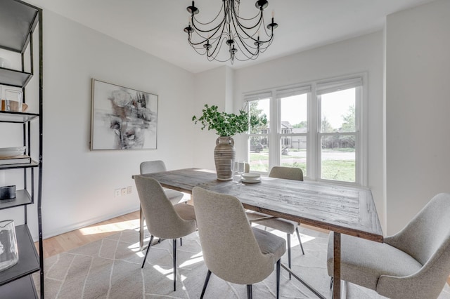 608 Claridge Ct, Franklin, TN 37064 - dining space with a chandelier and wood finished floors