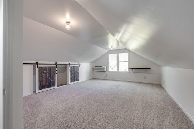 608 Claridge Ct, Franklin, TN 37064 - bonus room featuring carpet floors, lofted ceiling, baseboards, and a wall mounted AC