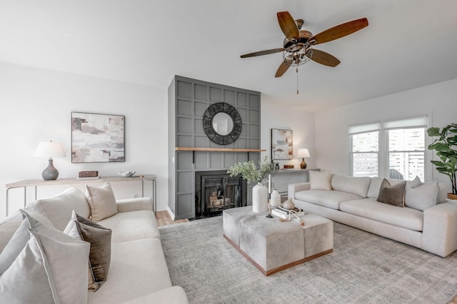 608 Claridge Ct, Franklin, TN 37064 - living area featuring ceiling fan, a large fireplace, and wood finished floors