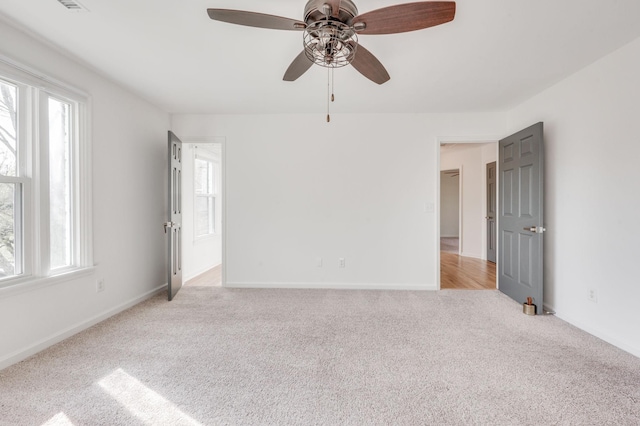 608 Claridge Ct, Franklin, TN 37064 - spare room with light colored carpet, plenty of natural light, ceiling fan, and baseboards