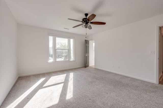 608 Claridge Ct, Franklin, TN 37064 - unfurnished room with light carpet, ceiling fan, and baseboards