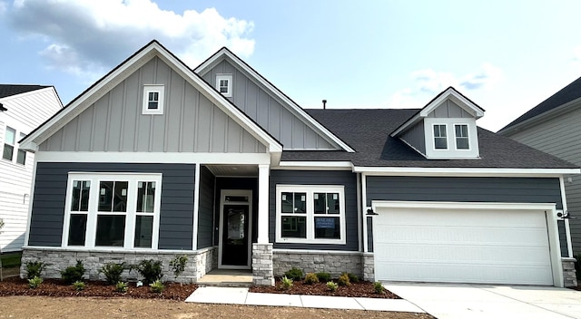 1065 Inez Dr, Smyrna, TN 37167 - craftsman house with stone siding, board and batten siding, and concrete driveway