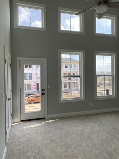 1451 Rebecca Johns Dr, Murfreesboro, TN 37128 - doorway featuring carpet flooring, a towering ceiling, plenty of natural light, and ceiling fan