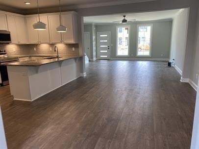 1451 Rebecca Johns Dr, Murfreesboro, TN 37128 - kitchen with stainless steel appliances, open floor plan, a ceiling fan, backsplash, and ornamental molding