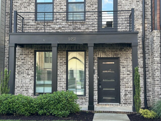 1451 Rebecca Johns Dr, Murfreesboro, TN 37128 - view of exterior entry featuring brick siding