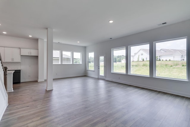 529 Little Penny Dr, Smyrna, TN 37167 - unfurnished living room with wood finished floors and recessed lighting