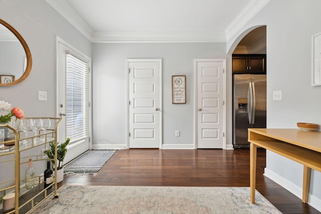 212 Walden Village Ln, Nashville, TN 37210 - entryway featuring arched walkways, crown molding, wood-type flooring, and baseboards
