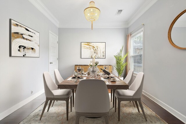 212 Walden Village Ln, Nashville, TN 37210 - dining area with a chandelier, ornamental molding, baseboards, and wood finished floors