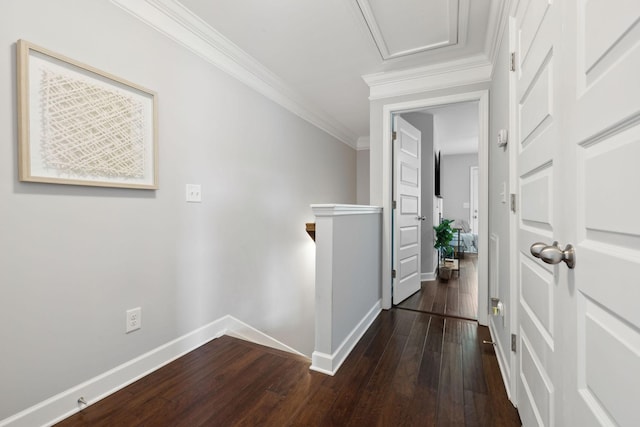 212 Walden Village Ln, Nashville, TN 37210 - hallway featuring dark wood-style floors, baseboards, crown molding, and an upstairs landing