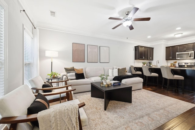 212 Walden Village Ln, Nashville, TN 37210 - living room featuring light wood-type flooring, ornamental molding, a ceiling fan, and recessed lighting