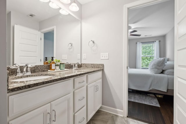 212 Walden Village Ln, Nashville, TN 37210 - ensuite bathroom with double vanity, baseboards, and ceiling fan