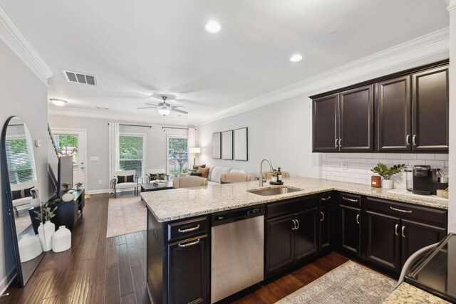 212 Walden Village Ln, Nashville, TN 37210 - kitchen with stainless steel dishwasher, a sink, a peninsula, a ceiling fan, and dark wood-style floors