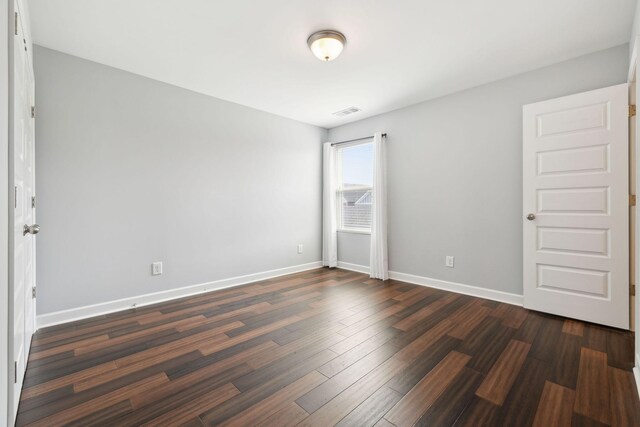 212 Walden Village Ln, Nashville, TN 37210 - unfurnished bedroom with dark wood finished floors and baseboards