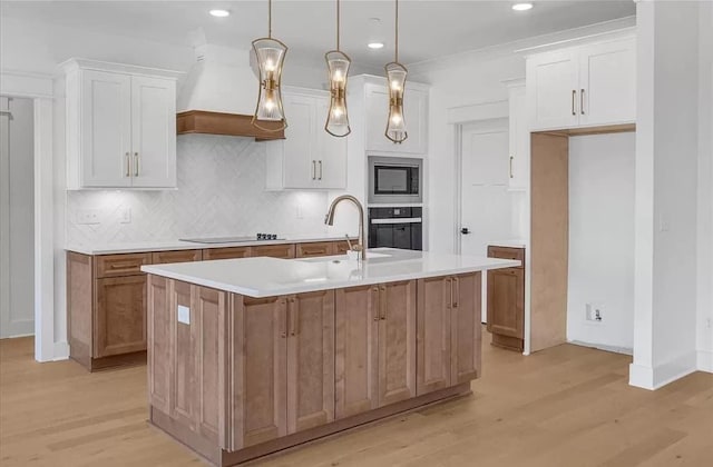 691 Compton Rd, Murfreesboro, TN 37130 - kitchen with black appliances, light wood finished floors, backsplash, white cabinets, and recessed lighting