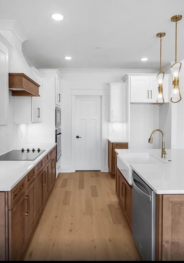 691 Compton Rd, Murfreesboro, TN 37130 - kitchen featuring appliances with stainless steel finishes, light wood-style floors, white cabinetry, light countertops, and recessed lighting