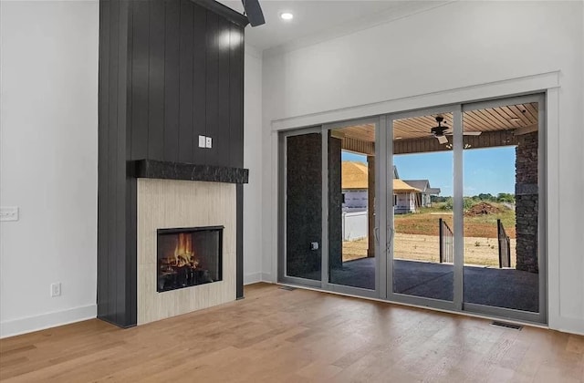 691 Compton Rd, Murfreesboro, TN 37130 - unfurnished living room with wood finished floors, ceiling fan, baseboards, a large fireplace, and recessed lighting
