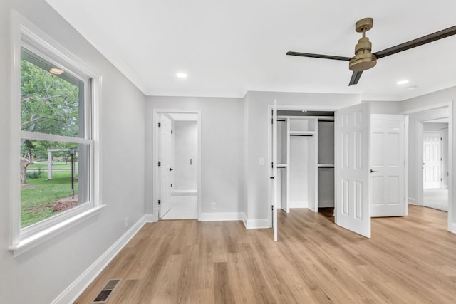 2302 Surrey Dr, Murfreesboro, TN 37129 - unfurnished bedroom with baseboards, light wood-style floors, connected bathroom, a closet, and recessed lighting