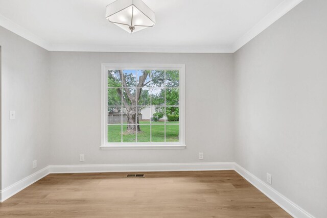 2302 Surrey Dr, Murfreesboro, TN 37129 - unfurnished room with light wood finished floors, baseboards, and crown molding