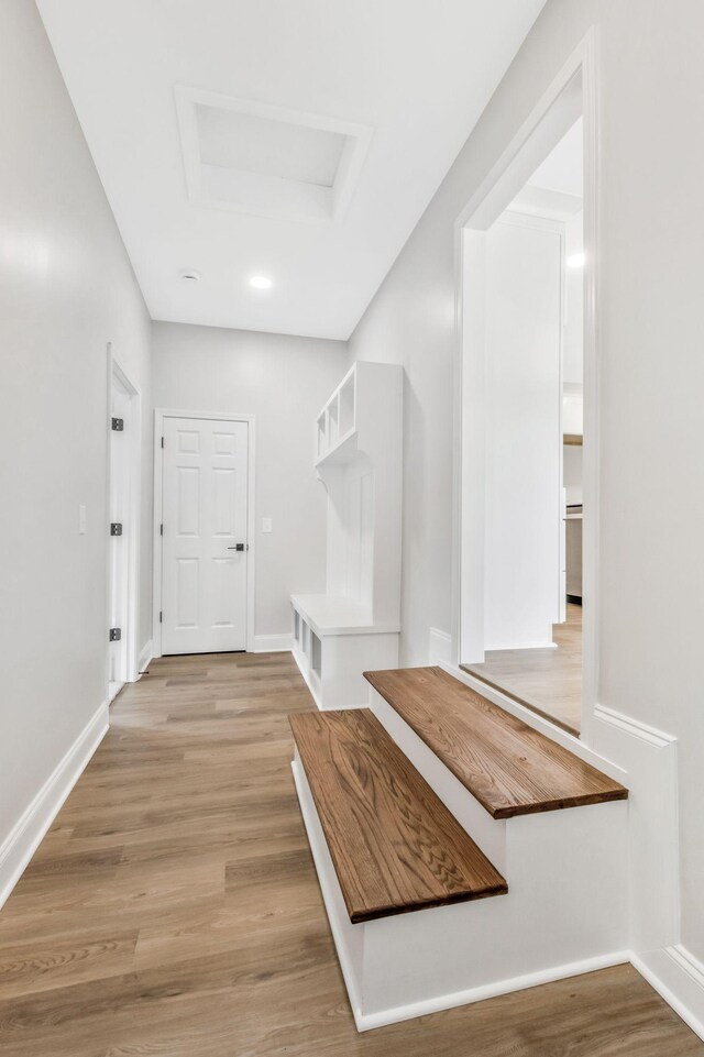 2302 Surrey Dr, Murfreesboro, TN 37129 - mudroom with attic access, light wood-type flooring, and baseboards