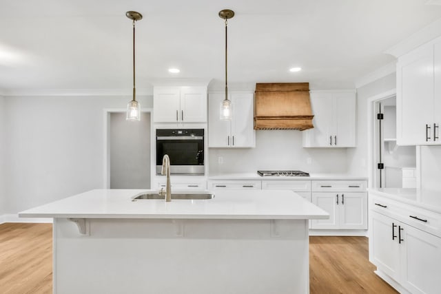 2302 Surrey Dr, Murfreesboro, TN 37129 - kitchen with oven, a sink, custom exhaust hood, crown molding, and gas stovetop